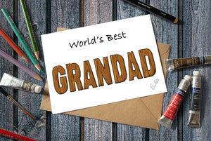 Card with 'World's Best Grandad' text.