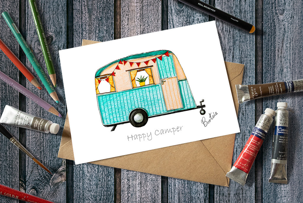 A Happy Camper Greetings Card with a Caravan illustration 