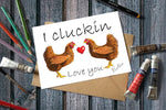 Greetings card with two chickens and text I cluckin love you.