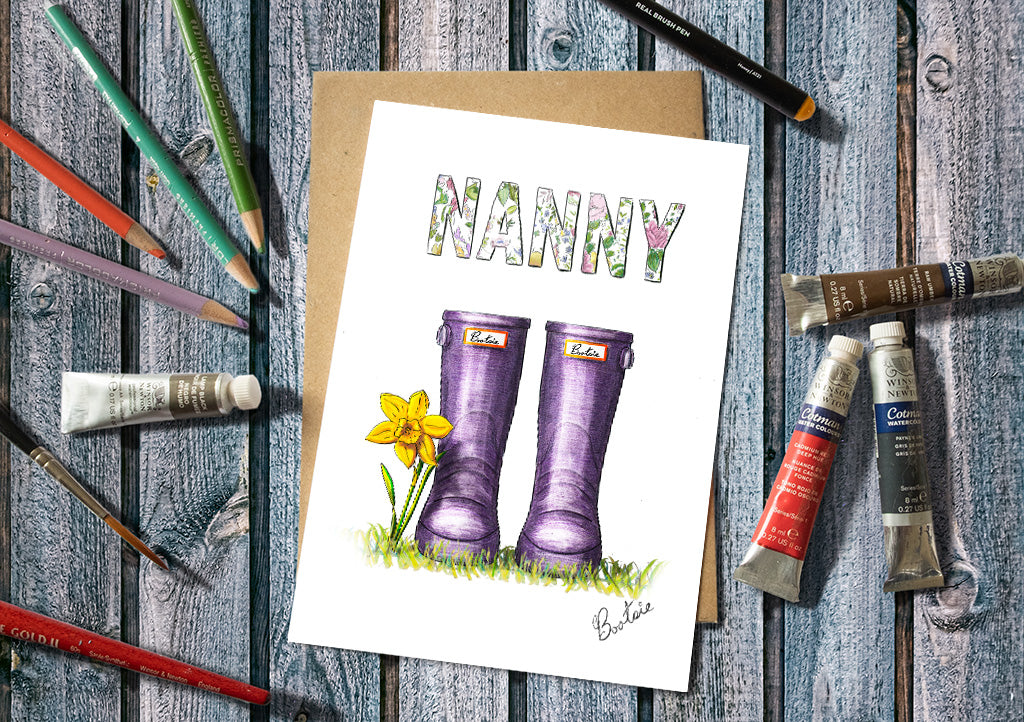 Nanny greeting card with purple wellies and a daffodil.